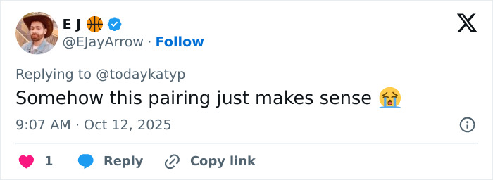 Tweet reply by EJayArrow expressing approval of an unexpected pairing, featuring a crying emoji.