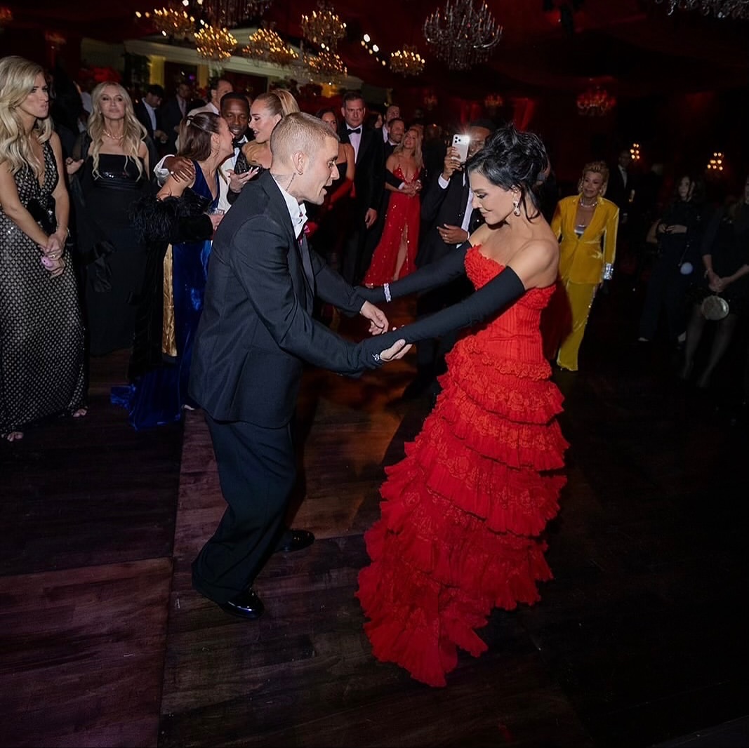 Kris Jenner Celebrated Her 70th Star Studded Birthday In A Red Strapless Givenchy Dress 19