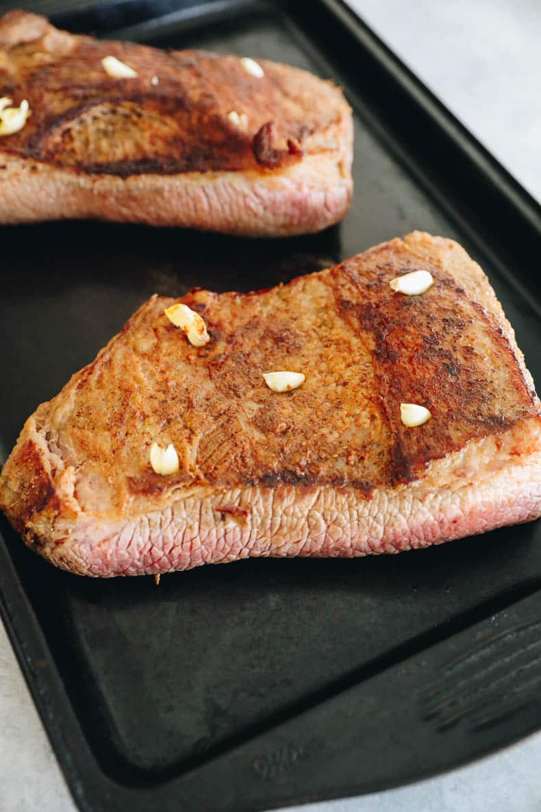 brisket with garlic clove cuts in it