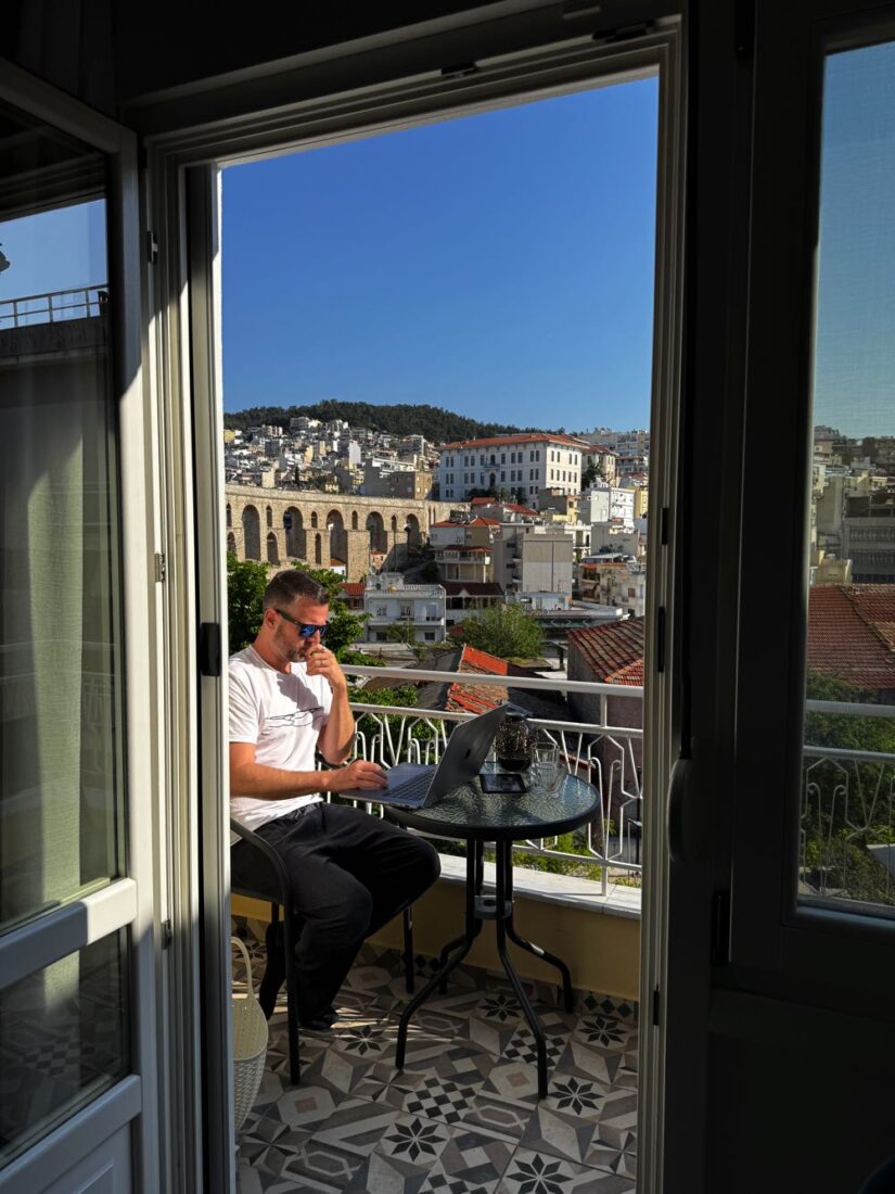 working from laptop in greece