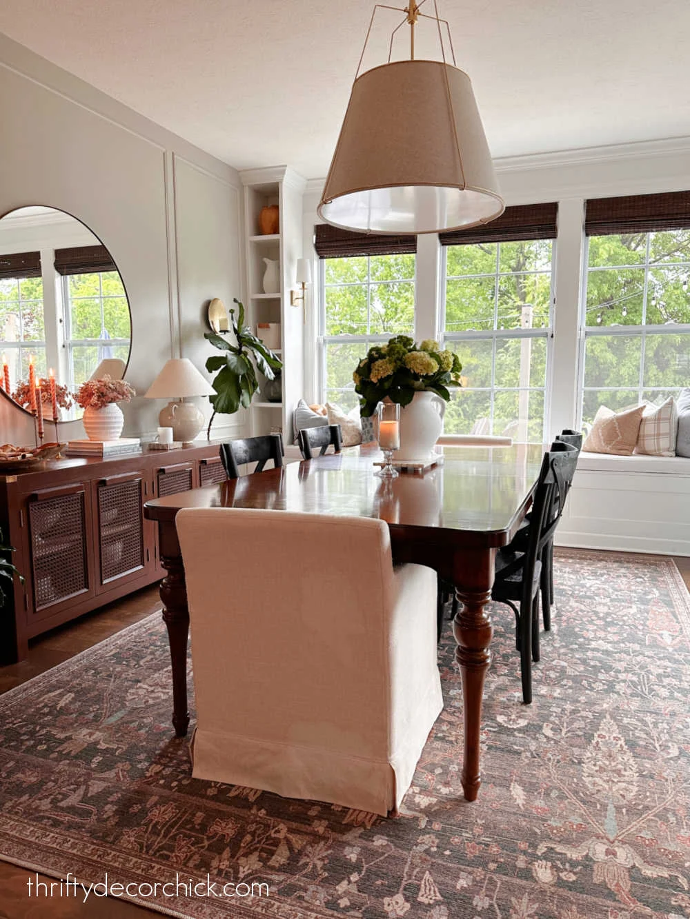 wood table with upholstered chairs