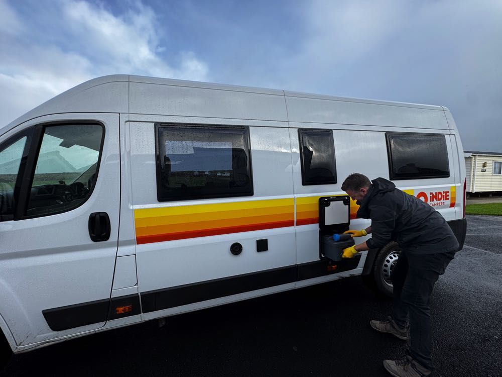 Nick Dumping The Tanks In The Campervan In Ireland.HEIC